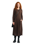 LEEZZA LUUKAA ASHTON brown striped midi dress with long sleeves and side pockets worn by a red-haired model